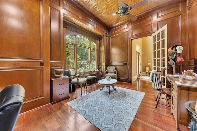 51 Mountain Ridge Dr SE, Cartersville, GA 30120 - home office with wood finished floors, ceiling fan, a decorative wall, french doors, and wood walls