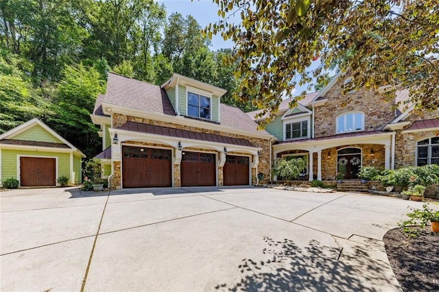 51 Mountain Ridge Dr SE, Cartersville, GA 30120 - view of front of property featuring stone siding, a garage, and driveway
