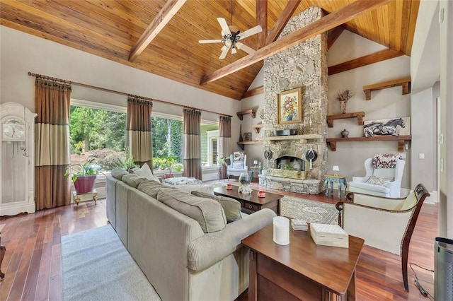 51 Mountain Ridge Dr SE, Cartersville, GA 30120 - living room featuring a wooden ceiling with exposed beams, ceiling fan, hardwood / wood-style floors, a stone fireplace, and high vaulted ceiling
