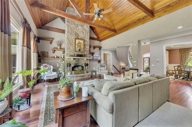51 Mountain Ridge Dr SE, Cartersville, GA 30120 - living area featuring wooden ceiling, healthy amount of natural light, wood finished floors, a stone fireplace, and ceiling fan