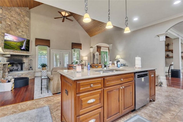 51 Mountain Ridge Dr SE, Cartersville, GA 30120 - kitchen with open floor plan, stainless steel dishwasher, arched walkways, ceiling fan, and wood ceiling