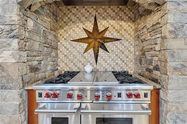 51 Mountain Ridge Dr SE, Cartersville, GA 30120 - kitchen featuring double oven range, ventilation hood, and backsplash