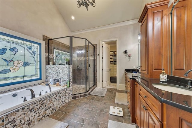 51 Mountain Ridge Dr SE, Cartersville, GA 30120 - full bath with a stall shower, vanity, a garden tub, vaulted ceiling, and crown molding