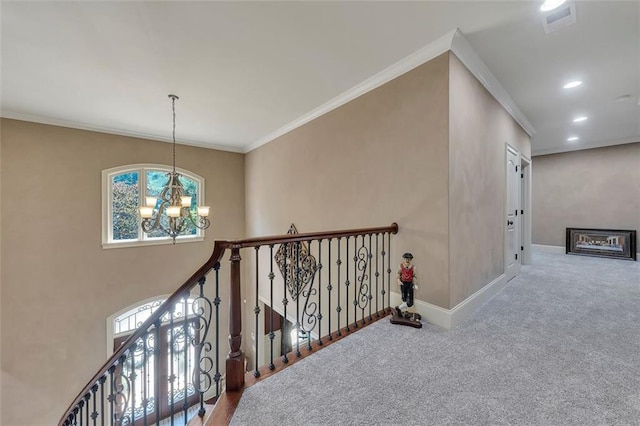 51 Mountain Ridge Dr SE, Cartersville, GA 30120 - hall with a chandelier, carpet, an upstairs landing, ornamental molding, and recessed lighting