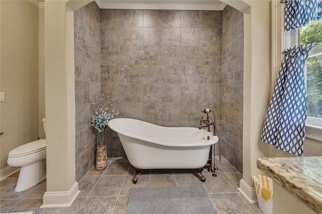 51 Mountain Ridge Dr SE, Cartersville, GA 30120 - bathroom featuring a freestanding tub, tile walls, and vanity