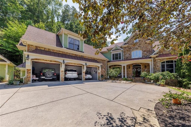 51 Mountain Ridge Dr SE, Cartersville, GA 30120 - view of front of house with stone siding, concrete driveway, a garage, and roof with shingles
