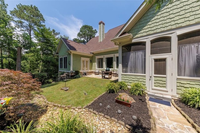 51 Mountain Ridge Dr SE, Cartersville, GA 30120 - back of house featuring a yard, a patio, a chimney, french doors, and a shingled roof