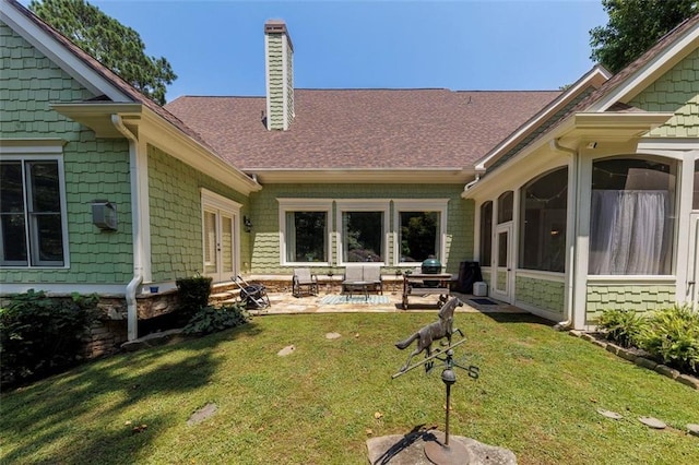 51 Mountain Ridge Dr SE, Cartersville, GA 30120 - view of green lawn with french doors, a patio, a sunroom, and entry steps