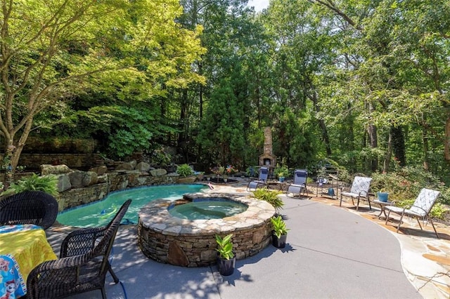 51 Mountain Ridge Dr SE, Cartersville, GA 30120 - view of patio featuring a pool with connected hot tub