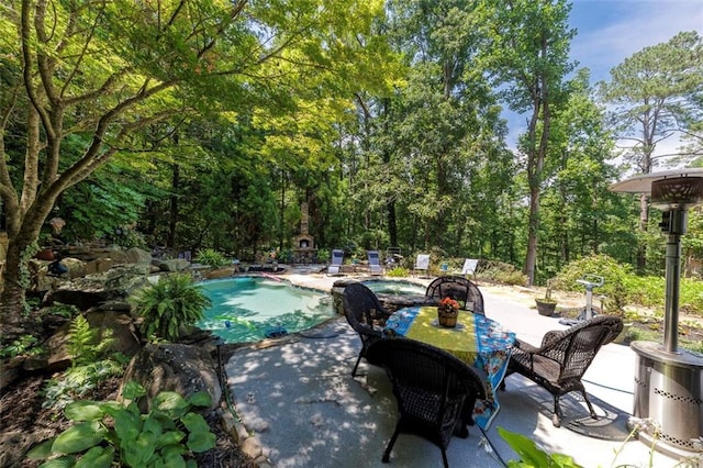 51 Mountain Ridge Dr SE, Cartersville, GA 30120 - view of patio featuring an outdoor pool
