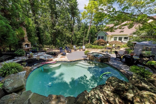 51 Mountain Ridge Dr SE, Cartersville, GA 30120 - swimming pool with a patio area and an in-ground hot tub