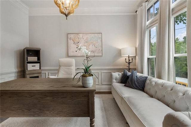 office area with an inviting chandelier, light hardwood / wood-style flooring, and ornamental molding