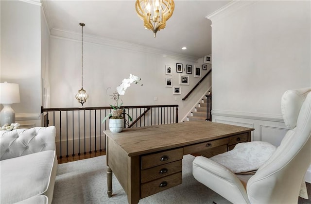 office area featuring an inviting chandelier, wood-type flooring, and crown molding