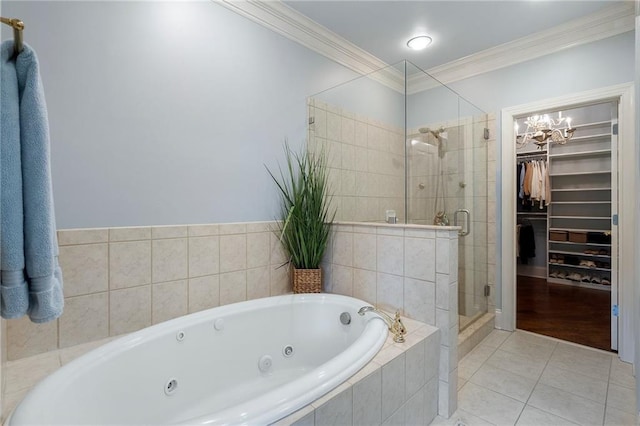 bathroom featuring ornamental molding, separate shower and tub, and tile patterned flooring