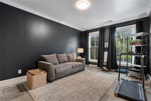 living room featuring crown molding