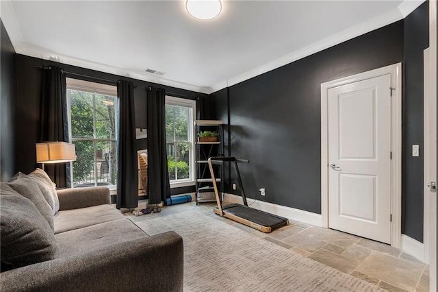 exercise area with crown molding