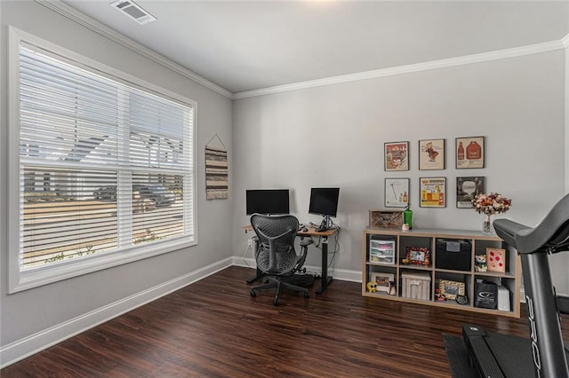 office featuring visible vents, baseboards, wood finished floors, and ornamental molding