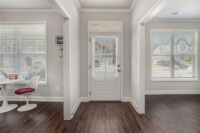 entryway with ornamental molding, dark wood-style flooring, visible vents, and baseboards