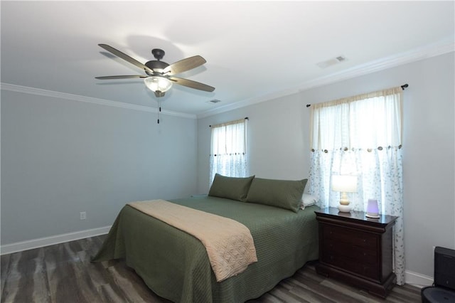 bedroom with ornamental molding, dark hardwood / wood-style floors, and ceiling fan