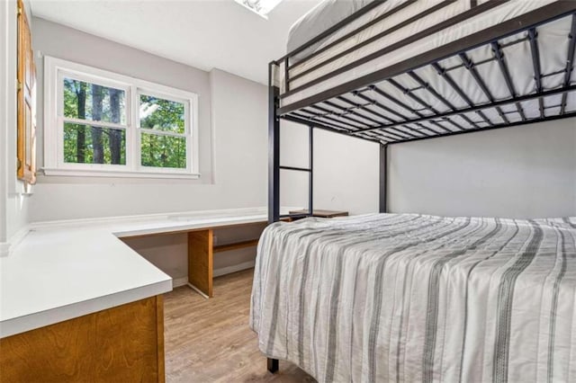 bedroom featuring light hardwood / wood-style floors