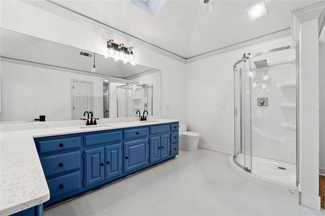 bathroom featuring vanity, ceiling fan, crown molding, toilet, and a shower with shower door