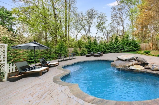 view of pool featuring a patio area and pool water feature