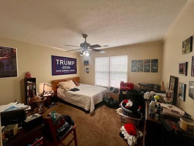 carpeted bedroom with ornamental molding and a ceiling fan