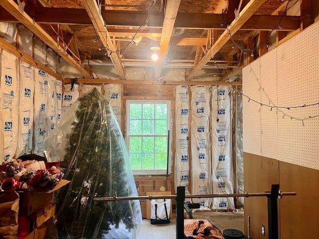 misc room with concrete flooring