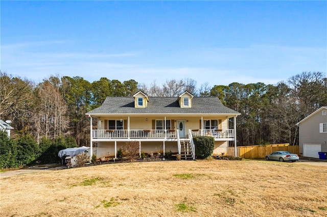 238 Brentwood Dr, Dallas, GA 30132 - new england style home featuring a porch, a garage, and a front lawn