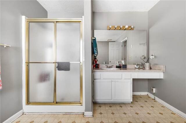 238 Brentwood Dr, Dallas, GA 30132 - bathroom featuring vanity, a shower with shower door, and a textured ceiling