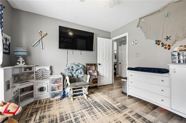 238 Brentwood Dr, Dallas, GA 30132 - living area with a textured ceiling and hardwood / wood-style flooring