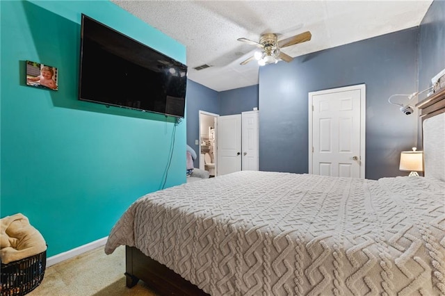 238 Brentwood Dr, Dallas, GA 30132 - carpeted bedroom with ceiling fan and a textured ceiling