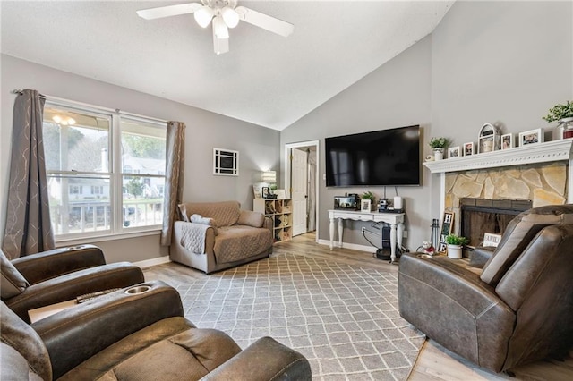 238 Brentwood Dr, Dallas, GA 30132 - living room with a fireplace, vaulted ceiling, light hardwood / wood-style flooring, and ceiling fan