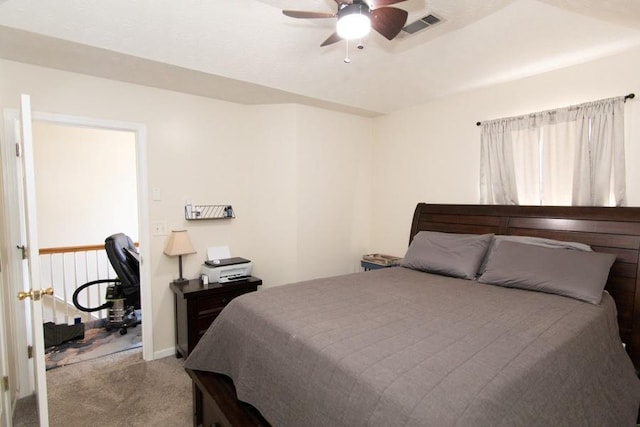 bedroom featuring baseboards, ceiling fan, carpet, and visible vents
