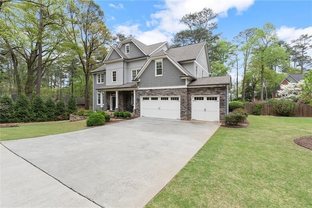 2811 Shady Valley Dr NE, Brookhaven, GA 30324 - craftsman inspired home with fence, a front yard, stone siding, concrete driveway, and an attached garage