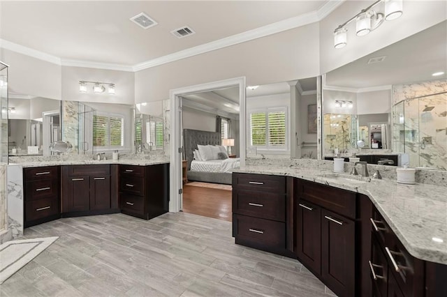 2811 Shady Valley Dr NE, Brookhaven, GA 30324 - bedroom with crown molding, baseboards, a tray ceiling, and visible vents