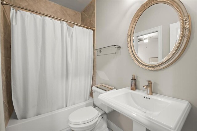 2811 Shady Valley Dr NE, Brookhaven, GA 30324 - laundry room with separate washer and dryer, a sink, cabinet space, and baseboards