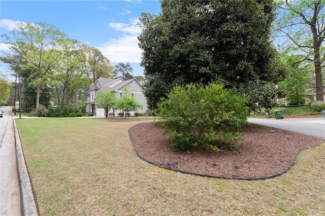 2811 Shady Valley Dr NE, Brookhaven, GA 30324 - craftsman inspired home featuring a porch, a front yard, fence, concrete driveway, and stone siding