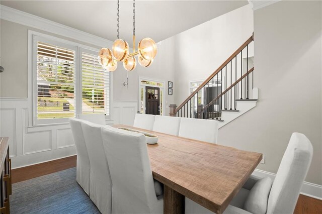 2811 Shady Valley Dr NE, Brookhaven, GA 30324 - office space with crown molding, wood finished floors, a notable chandelier, and a healthy amount of sunlight