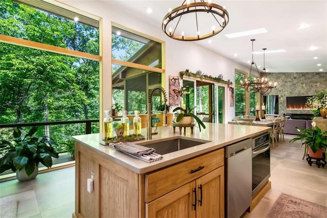 303 Clarice Ln, Sautee Nacoochee, GA 30571 - kitchen featuring a chandelier, dishwasher, open floor plan, a kitchen island with sink, and pendant lighting