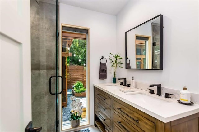 303 Clarice Ln, Sautee Nacoochee, GA 30571 - bathroom featuring double vanity and a shower with shower door