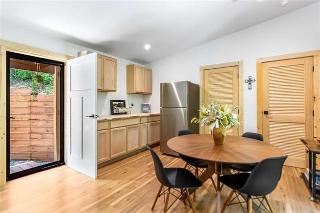 303 Clarice Ln, Sautee Nacoochee, GA 30571 - dining room featuring light wood-style floors, vaulted ceiling, and recessed lighting