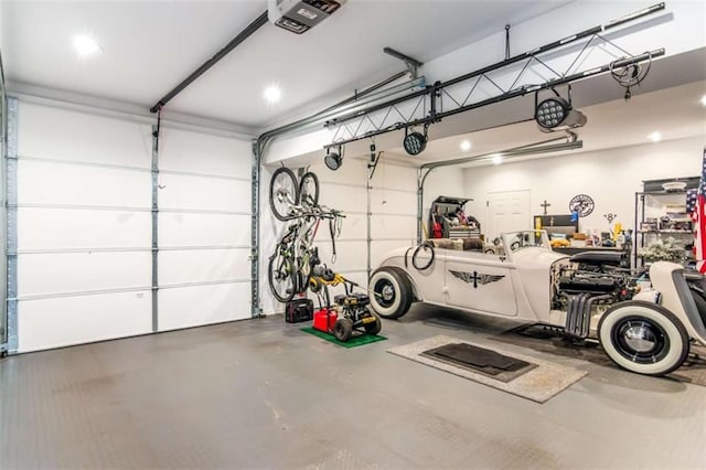 303 Clarice Ln, Sautee Nacoochee, GA 30571 - garage with a garage door opener and recessed lighting