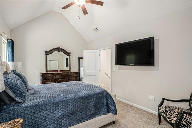 bedroom featuring baseboards, carpet, ceiling fan, and vaulted ceiling