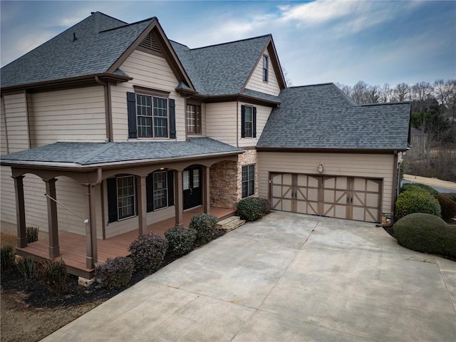 view of front facade featuring a garage and a porch