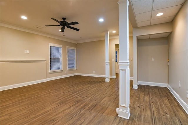 unfurnished living room with hardwood / wood-style floors, crown molding, ceiling fan, and ornate columns