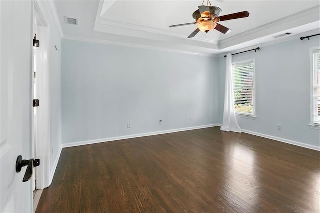5807 Brookstone Walk NW, Acworth, GA 30101 - unfurnished room with a tray ceiling, dark wood-type flooring, ceiling fan, and crown molding