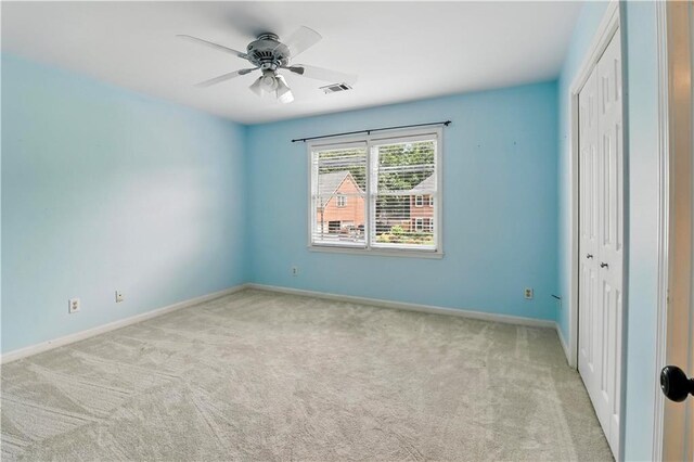 5807 Brookstone Walk NW, Acworth, GA 30101 - empty room with carpet floors and a ceiling fan