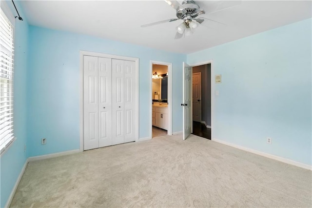 5807 Brookstone Walk NW, Acworth, GA 30101 - unfurnished bedroom featuring carpet flooring, a closet, and multiple windows