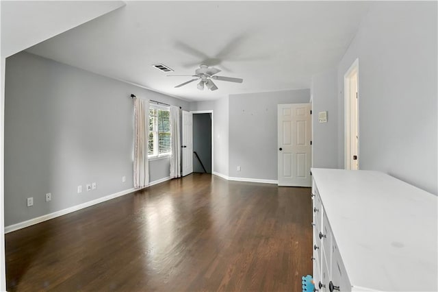5807 Brookstone Walk NW, Acworth, GA 30101 - unfurnished living room with a ceiling fan and dark wood-style flooring